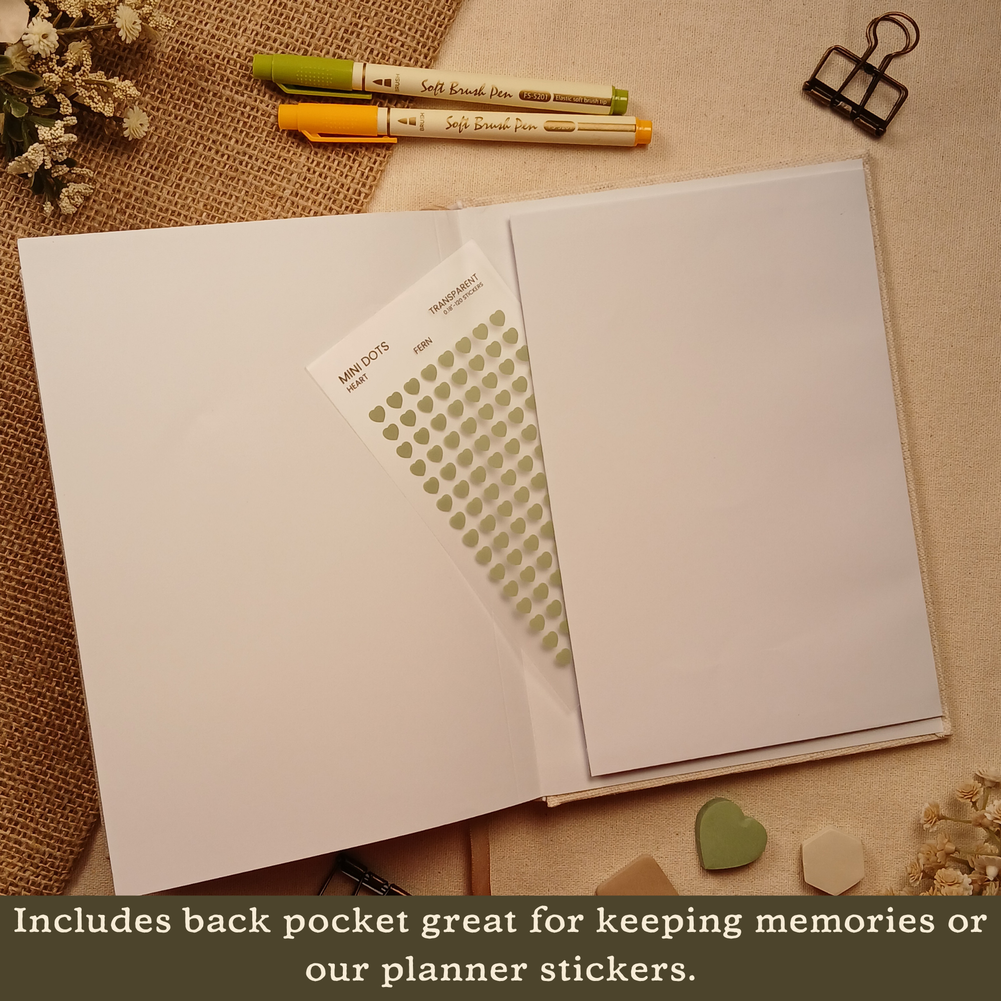 Back pocket inside the Booked Journal holding transparent planner stickers, designed for storing keepsakes, stickers, or loose papers. Text on image: 