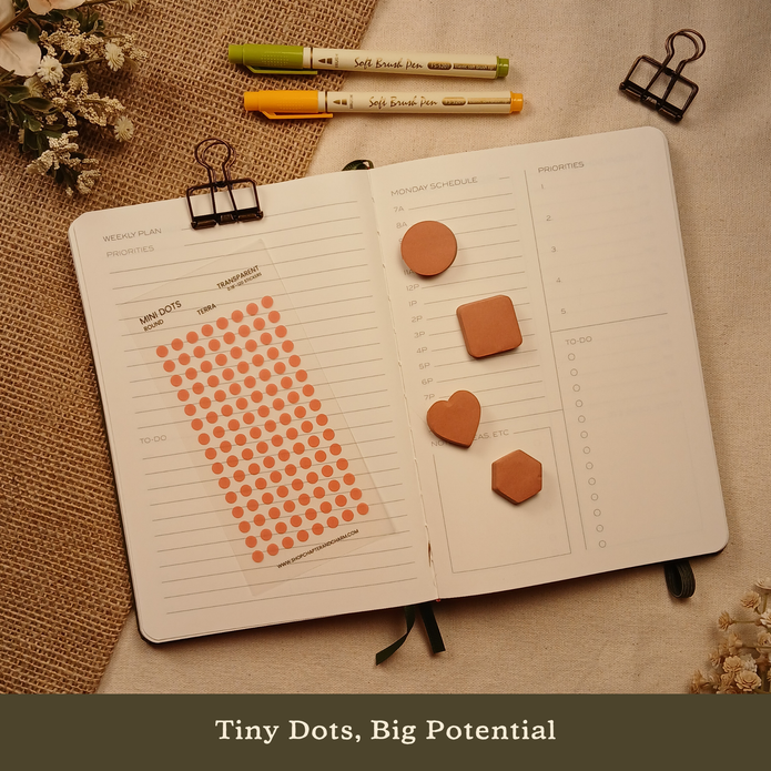 Terra rust transparent matte round planner dot stickers displayed with matching sticky notes on an open planner. The image includes the text, 