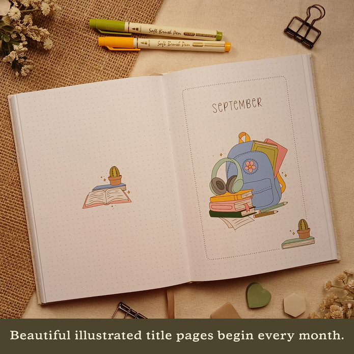 Open Booked Journal displaying a colorful September illustrated title page with backpack, books, headphones, and stationery. Text on image: 