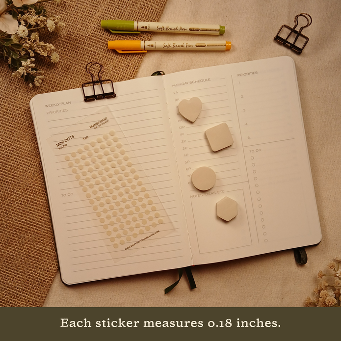 Tan transparent matte round planner dot stickers displayed with matching sticky note shapes on an open planner. The image includes the text, 