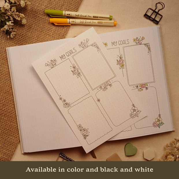 The My Goals stick-in page displayed alongside the same page inside an A5 dotted journal, showcasing how the insert fits seamlessly into your notebook. Available in both full color and black and white, allowing you to choose between a softly decorated spread or one you can personalize yourself. Available in color and black and white.