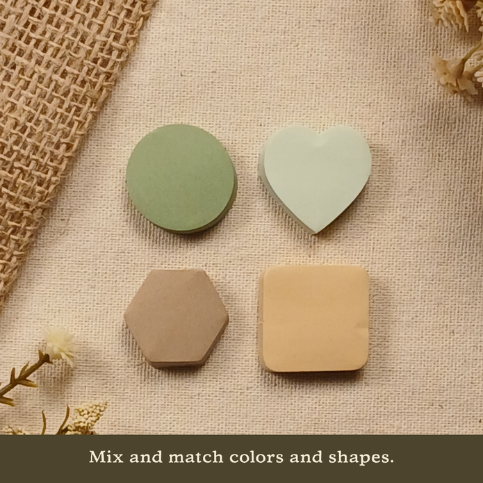 Four sticky note shapes including circle, heart, hexagon, and rounded square displayed on a neutral linen background with the text 